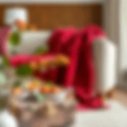 A luxurious cherry red throw blanket draped elegantly over a stylish sofa