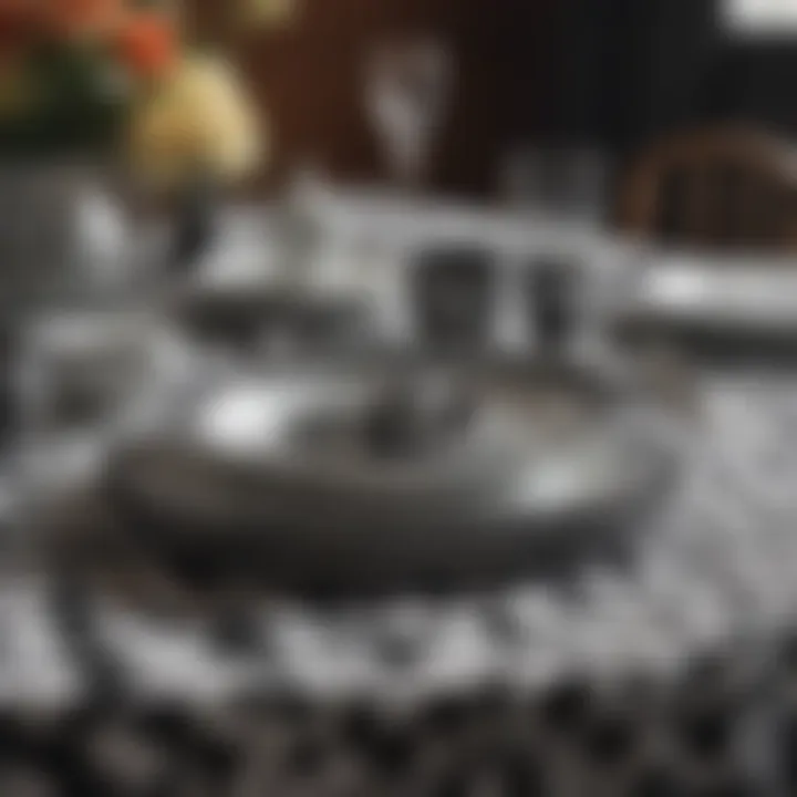 Close-up of a black and white checkered tablecloth with decorative tableware