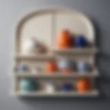 Elegant wall dish shelf displaying a curated collection of ceramics