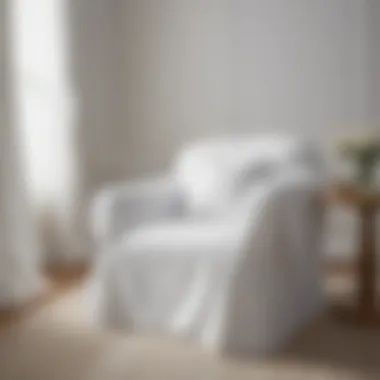 Elegant white slipcover draped over a modern chair