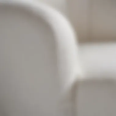 Close-up of the fabric texture of a white chair slipcover