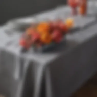 Stylish gray oblong tablecloth with decorative centerpiece