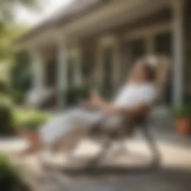 User enjoying the Hampton Bay Zero Gravity Chair in an outdoor setting